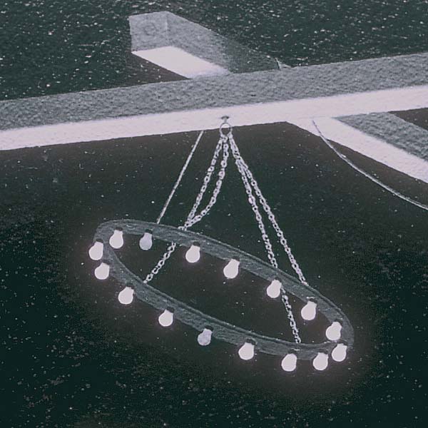 Detail of a game of craps-- for life or for death-- focusing on the chandelier that illuminates the ghostly ruins, with its circle of bare light bulbs, some working and some not